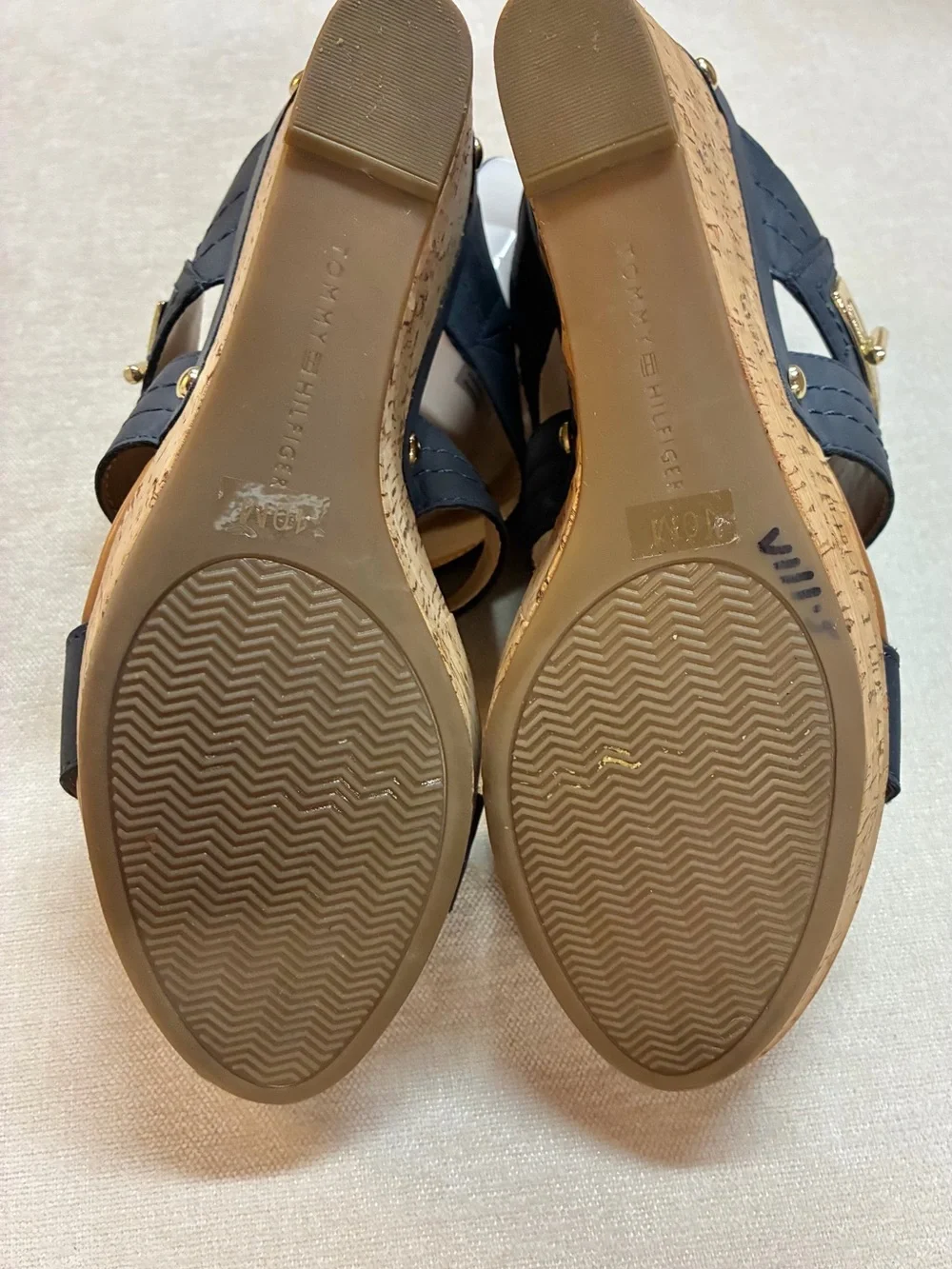 Tommy Hilfiger women’s cork wedge slide sandals with gold-tone logo hardware